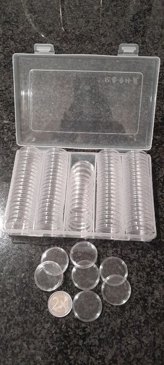 Estuche de monedas con 100 capsulas.