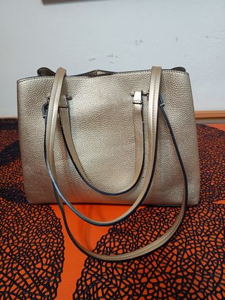 Bolso dorado Parfois