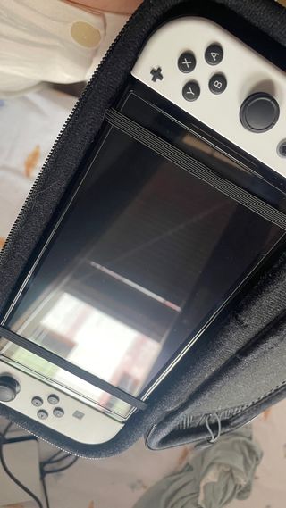 Nintendo Switch OLED - Blanca y Negra