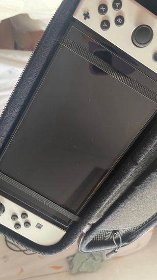 Nintendo Switch OLED - Blanca y Negra