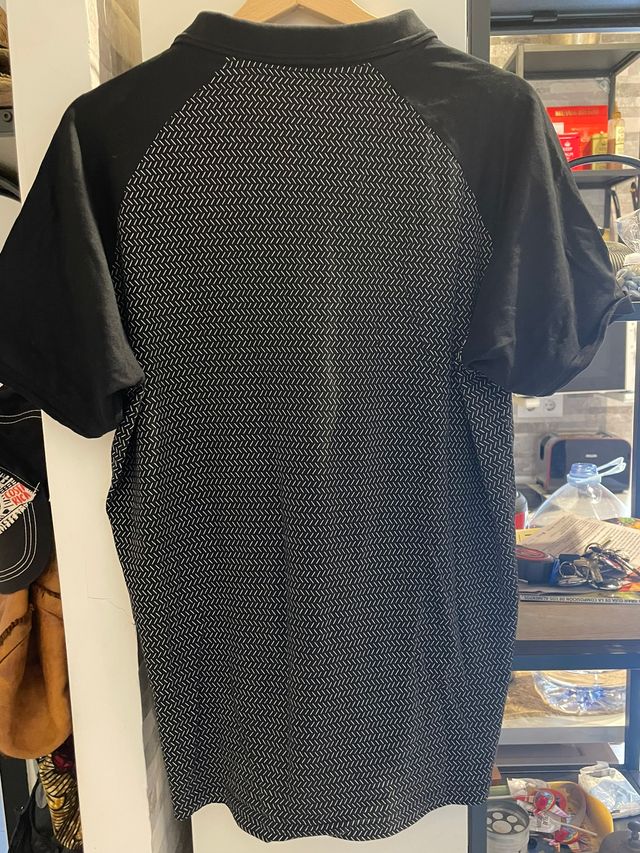 Polo negro - blanco hombre