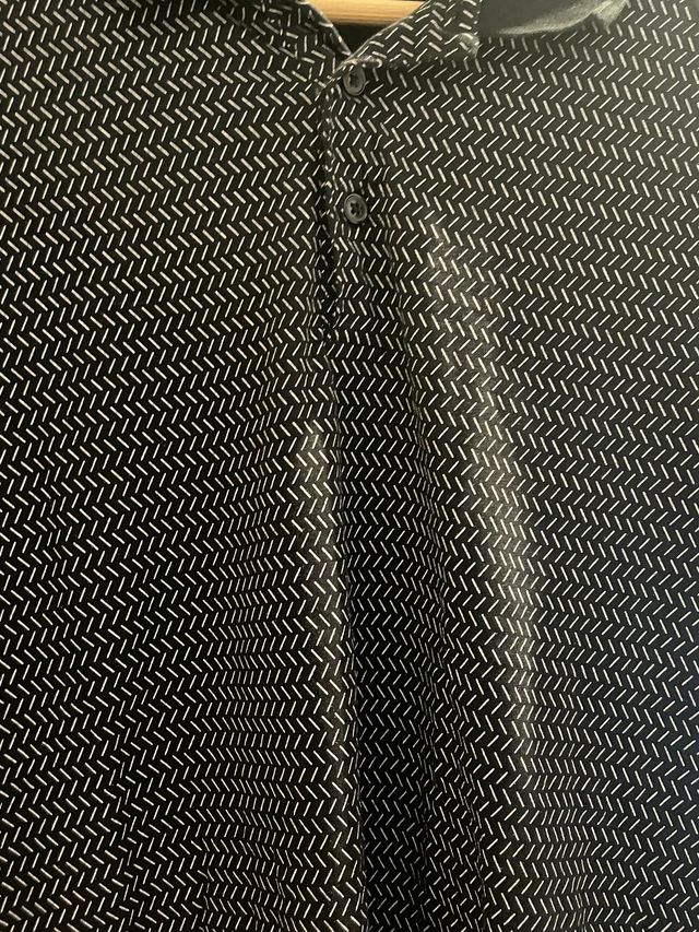 Polo negro - blanco hombre