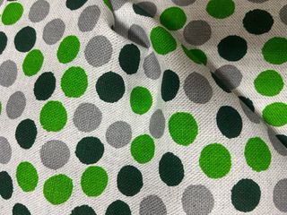 Tessuto cotone a pois verde-grigio