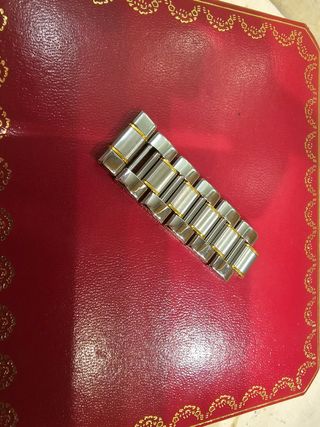 Segmento de 6 eslabones Cartier Must 21 mas caja