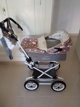 Carrito para muñecas marca de cuevas toys 