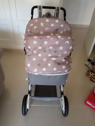 Carrito para muñecas marca de cuevas toys 