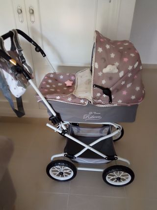Carrito para muñecas marca de cuevas toys 