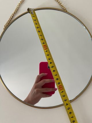 Espejos redondos dorados (x2)