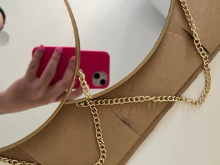 Espejos redondos dorados (x2)