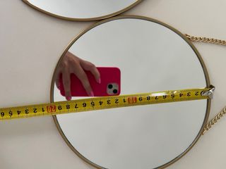 Espejos redondos dorados (x2)