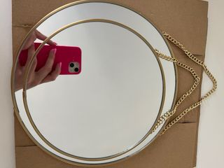 Espejos redondos dorados (x2)