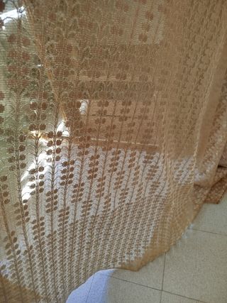 Cortinas beige y doradas