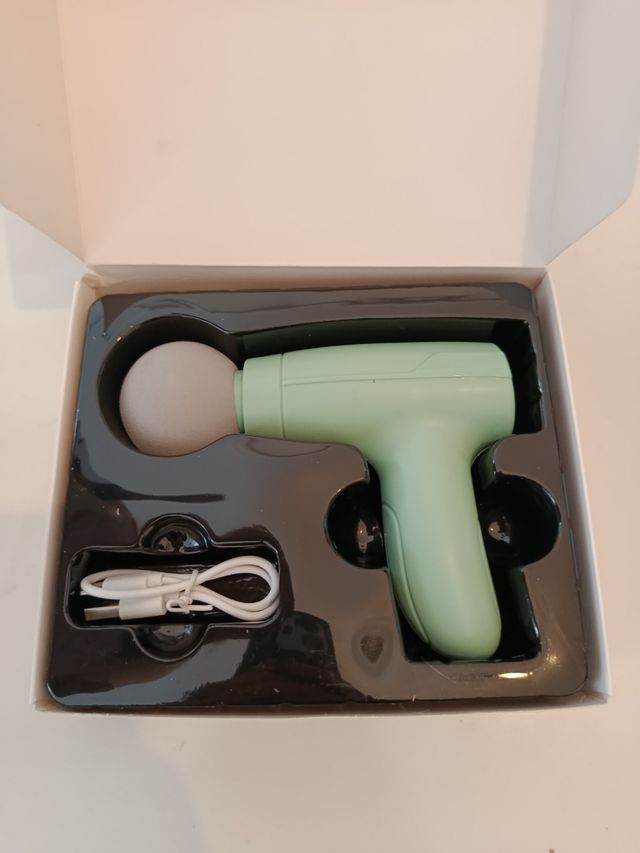 Mini pistola de masaje facial