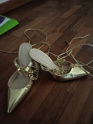 Scarpe oro con tacco 