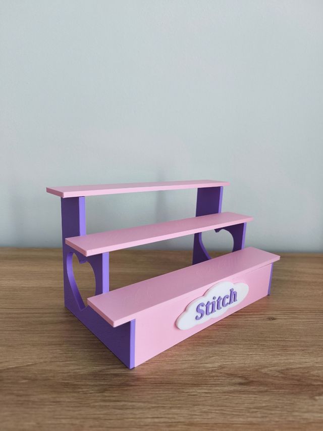 Expositor funkos Stitch rosa