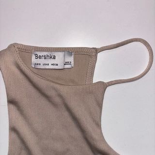 Top asimétrico beige 