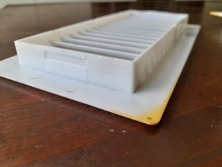 Una rejilla  ventilación plástico 
