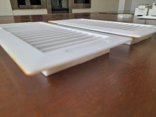 Una rejilla  ventilación plástico 