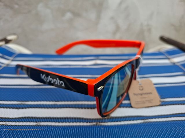 Gafas sol Kubota - negras y naranjas
