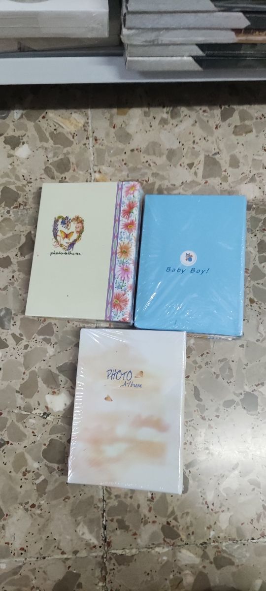 3 álbumes fotos KOLMAR bebés