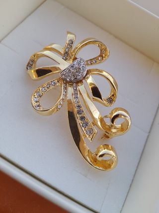 Spilla fiocco oro e cristalli