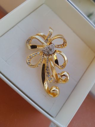 Spilla fiocco oro e cristalli