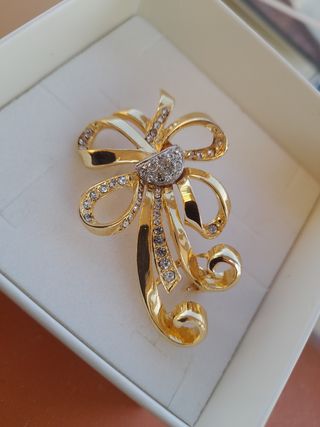 Spilla fiocco oro e cristalli