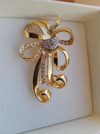 Spilla fiocco oro e cristalli