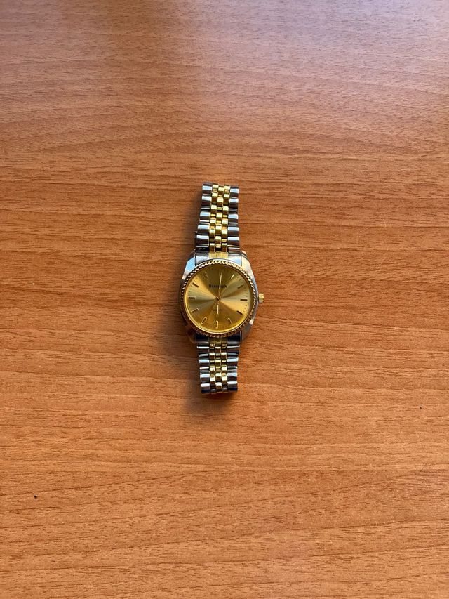 Reloj Berenson Quartz dorado y plateado