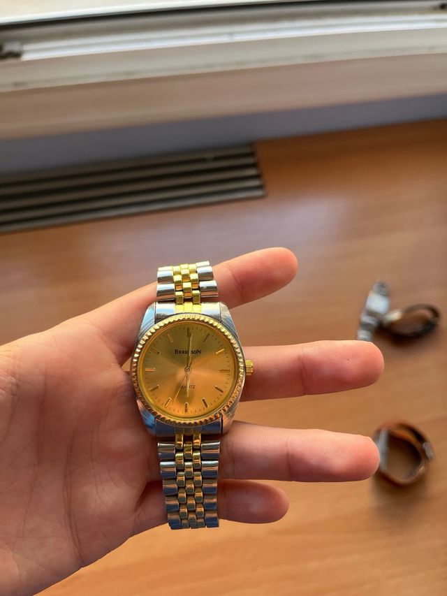 Reloj Berenson Quartz dorado y plateado