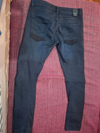 Vaqueros Guess negros