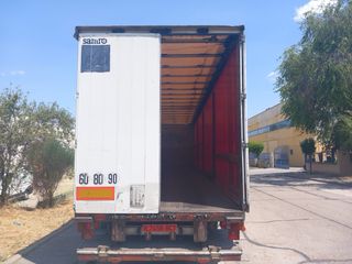 semitauliner con trampilla