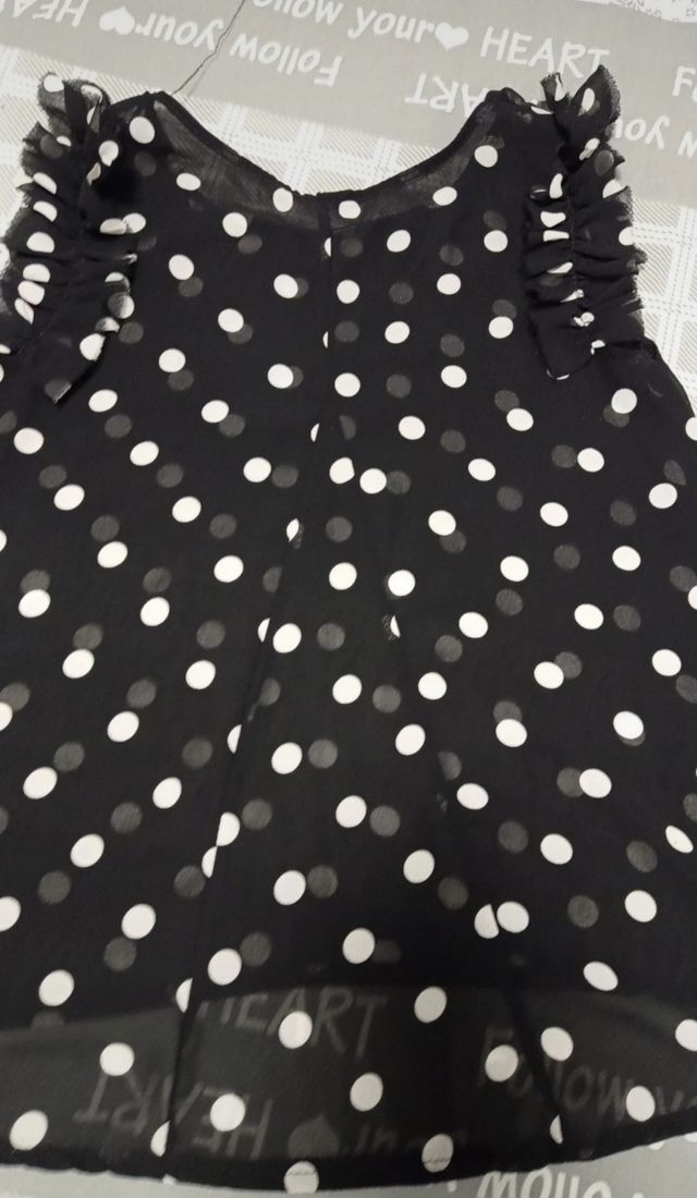 Canotta pois nera e bianca