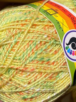 11 ovillos Perle Stop - 100g - Amarillo jaspeado