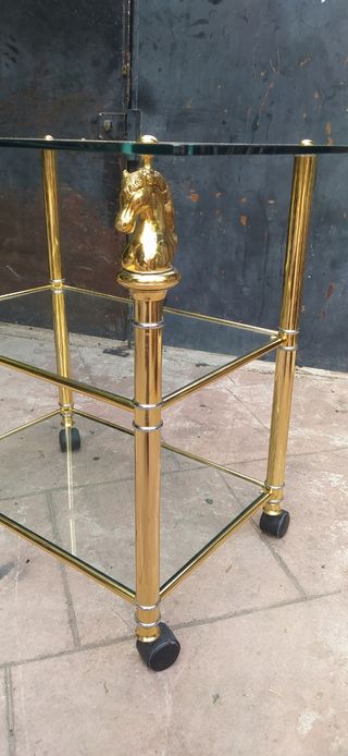 Mesa cristal y bronce ..buen estado 