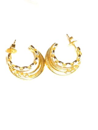 Pendientes Guess dorados y plateados
