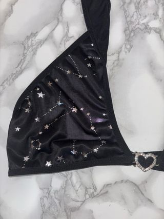 Top bikini nero costellazione