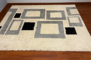 Alfombra moderna beige y gris