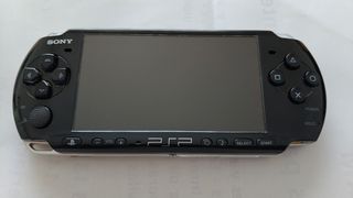 PSP 3004 Sony negra rebajada. Funda, cargador, etc