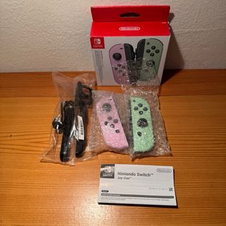Joycon Nintendo Switch lilla verde scatola
