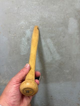 bate de beisbol de madera.