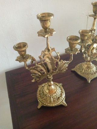 Candelabros bronce 3 brazos los dos 40 euros 
