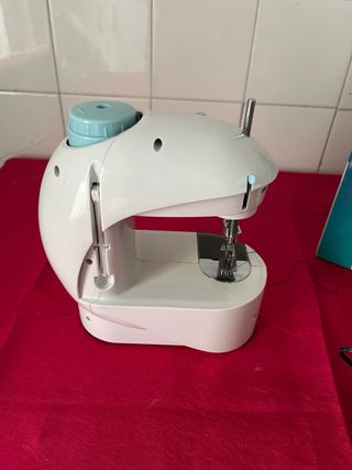 Máquina de coser portátil