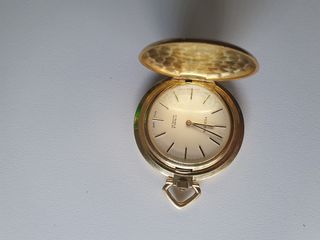 Reloj de bolsillo Festina chapado en oro con caden