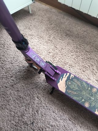 Patinete Oxelo Mid 5 morado