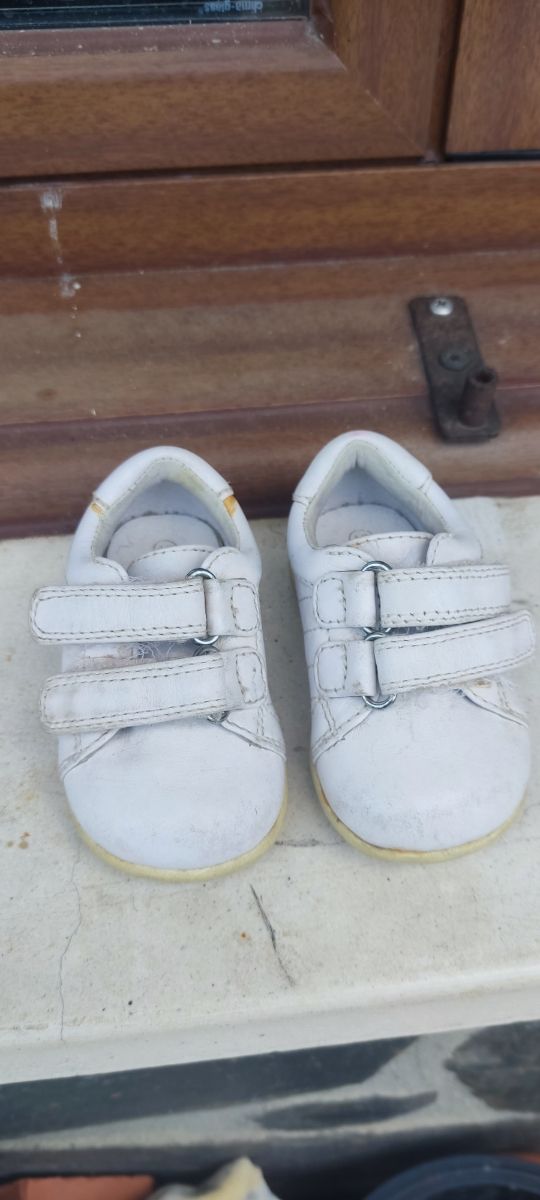 Zapatos blancos d'bebe