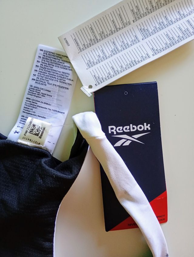 Top sportivo Reebok 2XS nero-bianco.