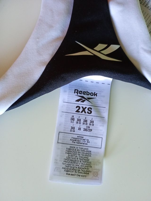 Top sportivo Reebok 2XS nero-bianco.