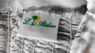 Pantaloni L’Atelier larghi grigio-bianchi