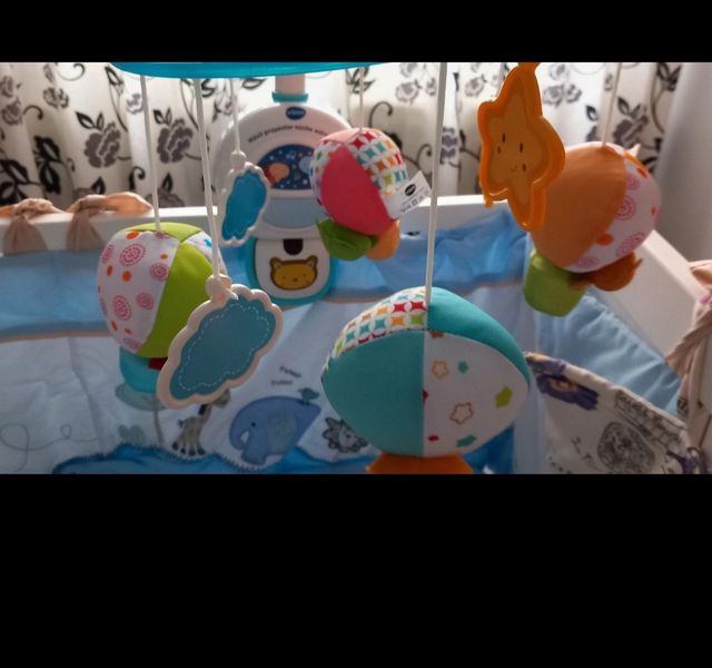 Proyector móvil bebé - Azul y Amarillo
Con mando